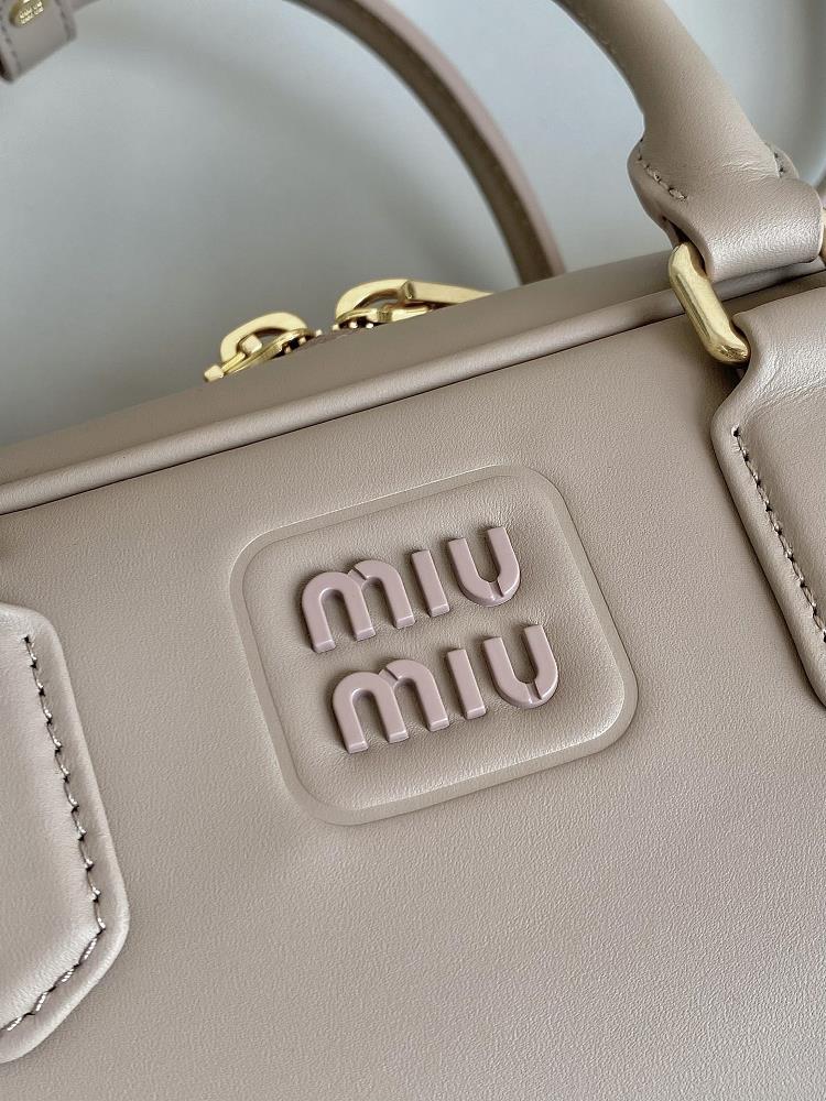 I particularly love how the Miumiu Bowling bag can elevate even the most basic of outfits