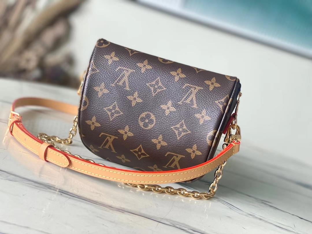 The toplevel original M82335 Mini Bumbag handbag is made of Monogram canvas showcasing a gentl