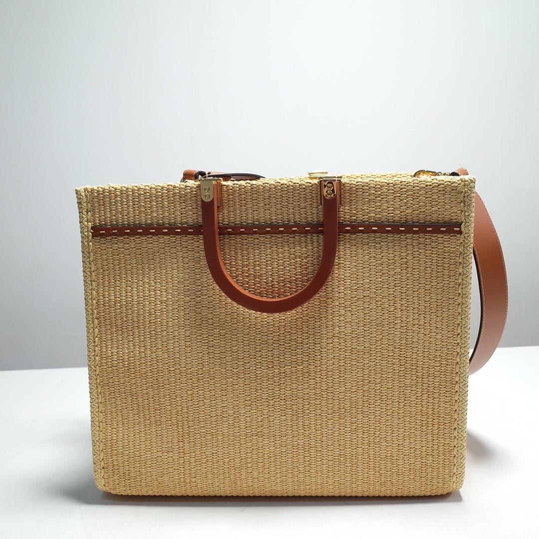 FENDI Sunshine Medium tote bag made of natural grass woven material showcasing a mossy stitchi