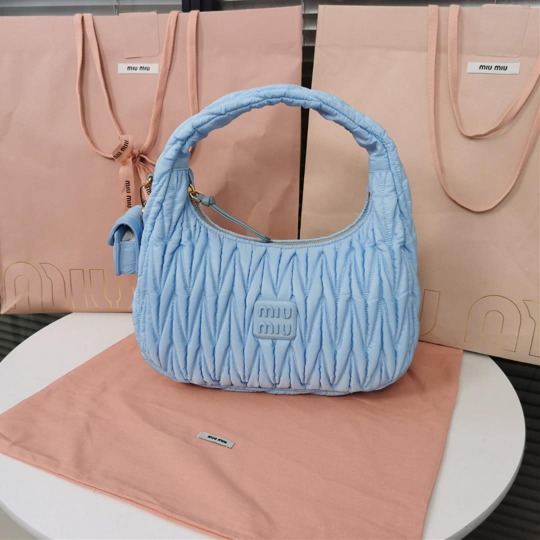 MiuWander handbag a new product of M family is made of environmentfriendly nylon The yarn is made of