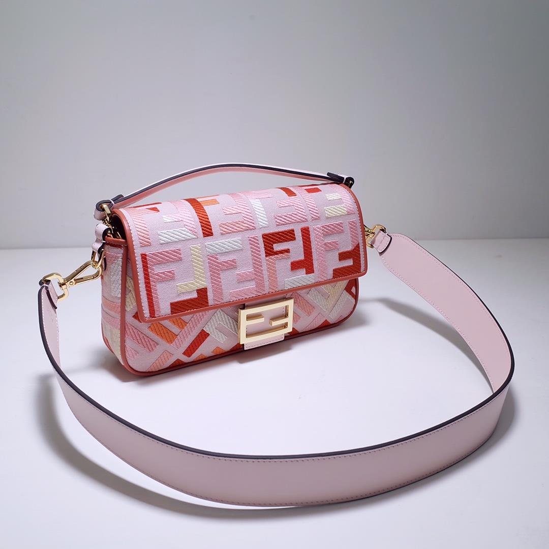 The FEND1 iconic Baguette handbag is made of canvas material and is adorned with red and pink 