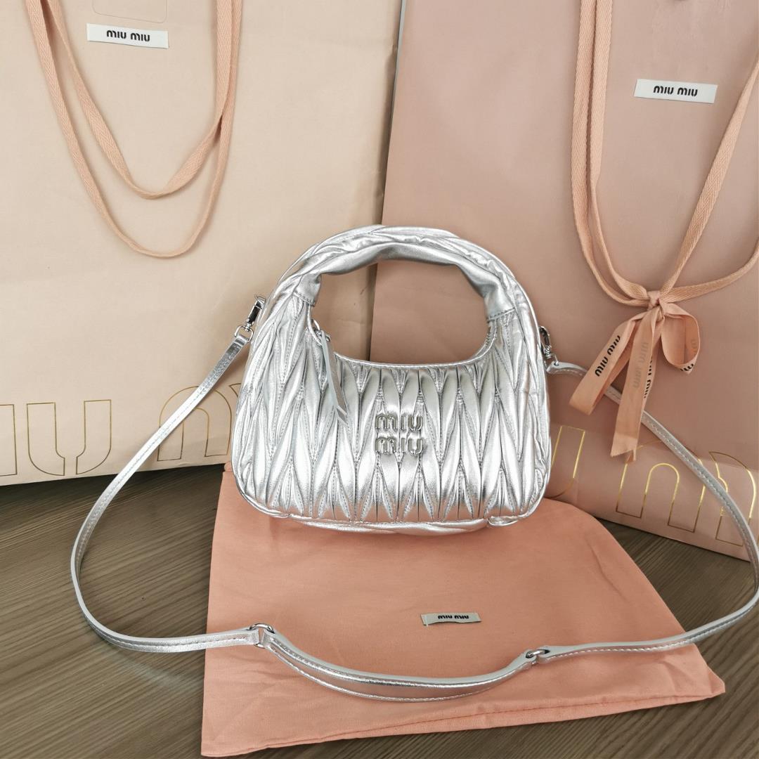 Medium The MiuWander handbag a new product from M family features the iconic Matelasse texture embro