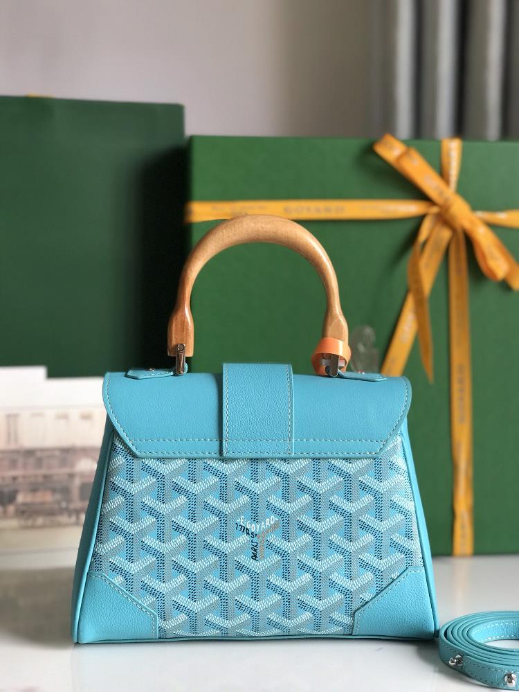 The Turquoise Blue hue of the Goyard Sagon mini bag is a refreshing departure from the tra