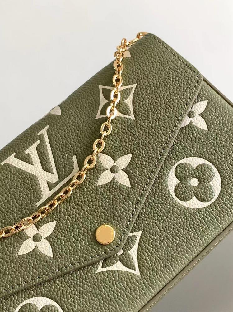 M64064 This Pochette Flice chain pack features a Monogram Imprente leather painted Monogra