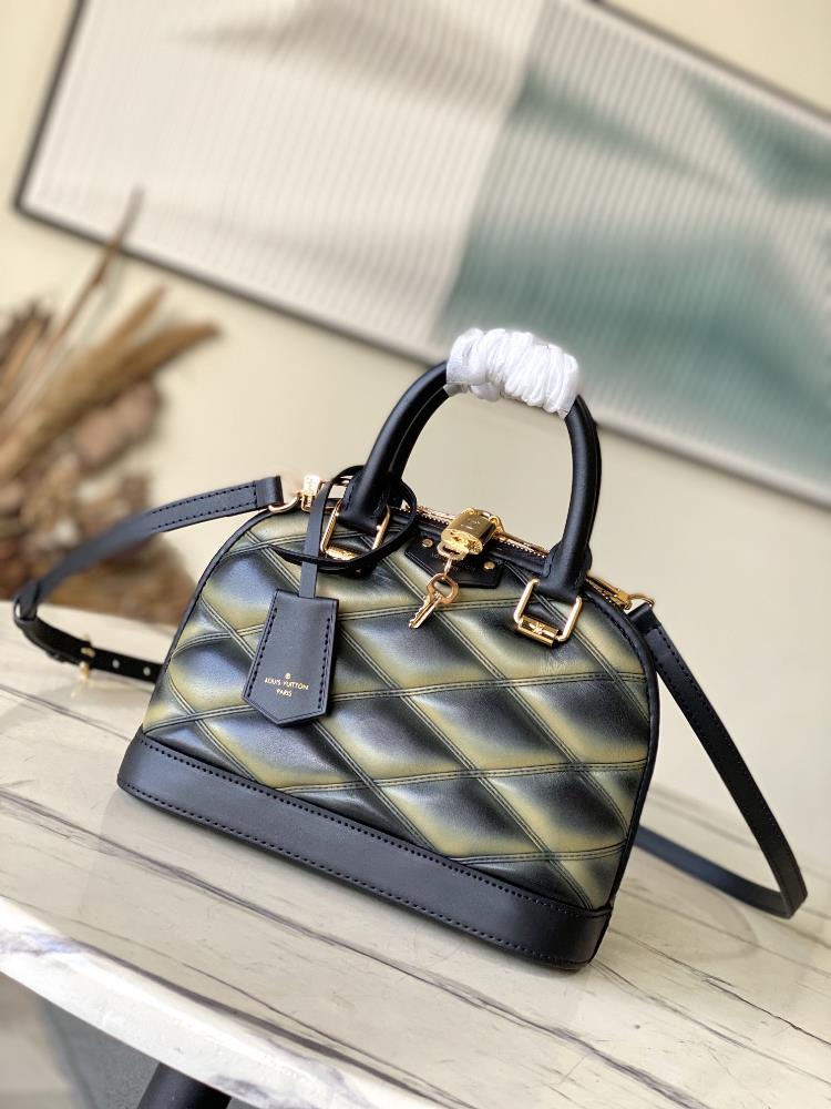 M23666 Gradient M23576 GradientNicolas Ghesquires iconic Alma BB handbag is accented with sheep leather lining creating subtle shadow effects and ba