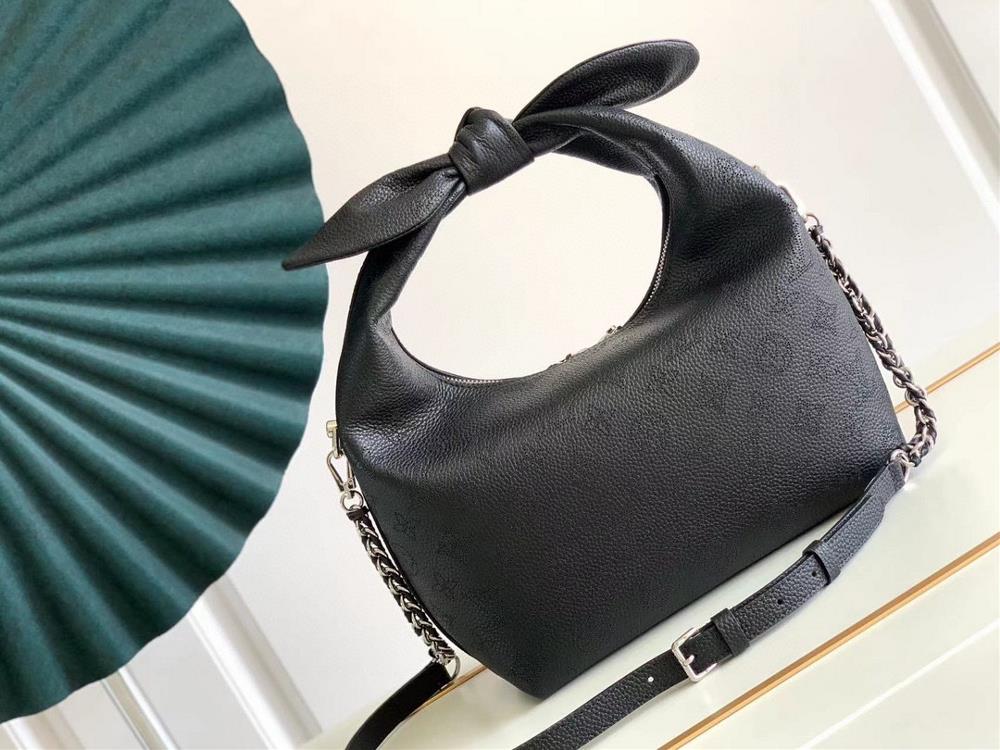 What sets the LV Bag M20700 apart from other handbags is its unique knot detailing which