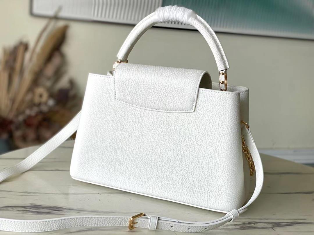 The top quality original M22512 white Capuchines medium size handbag showcases the new seasons