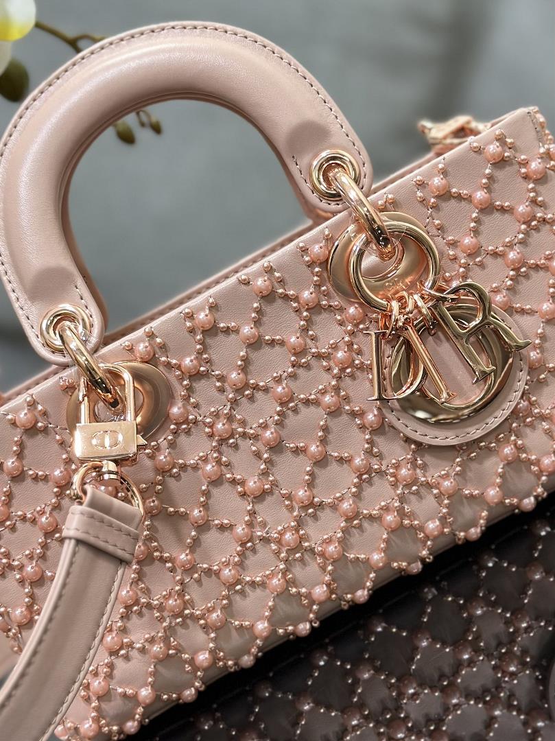 The Lady DJoy horizontal embroidery features half pearl rose gold and a sheepskin lining