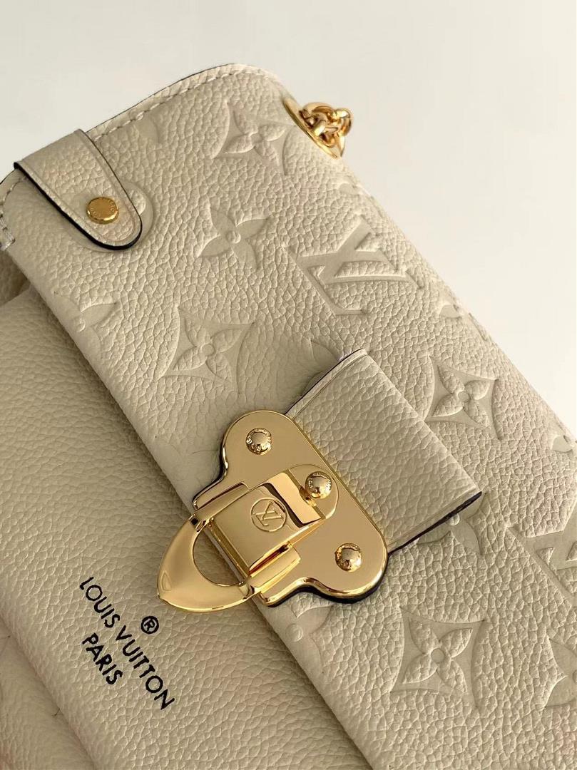 M44550 The smooth and embossed Monogram Imprente combines silky and textured texture with