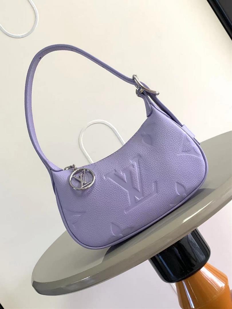 The M82391 M82519 Mini Moon handbag is made of soft Monogram Imprente embossed leather allowing eye