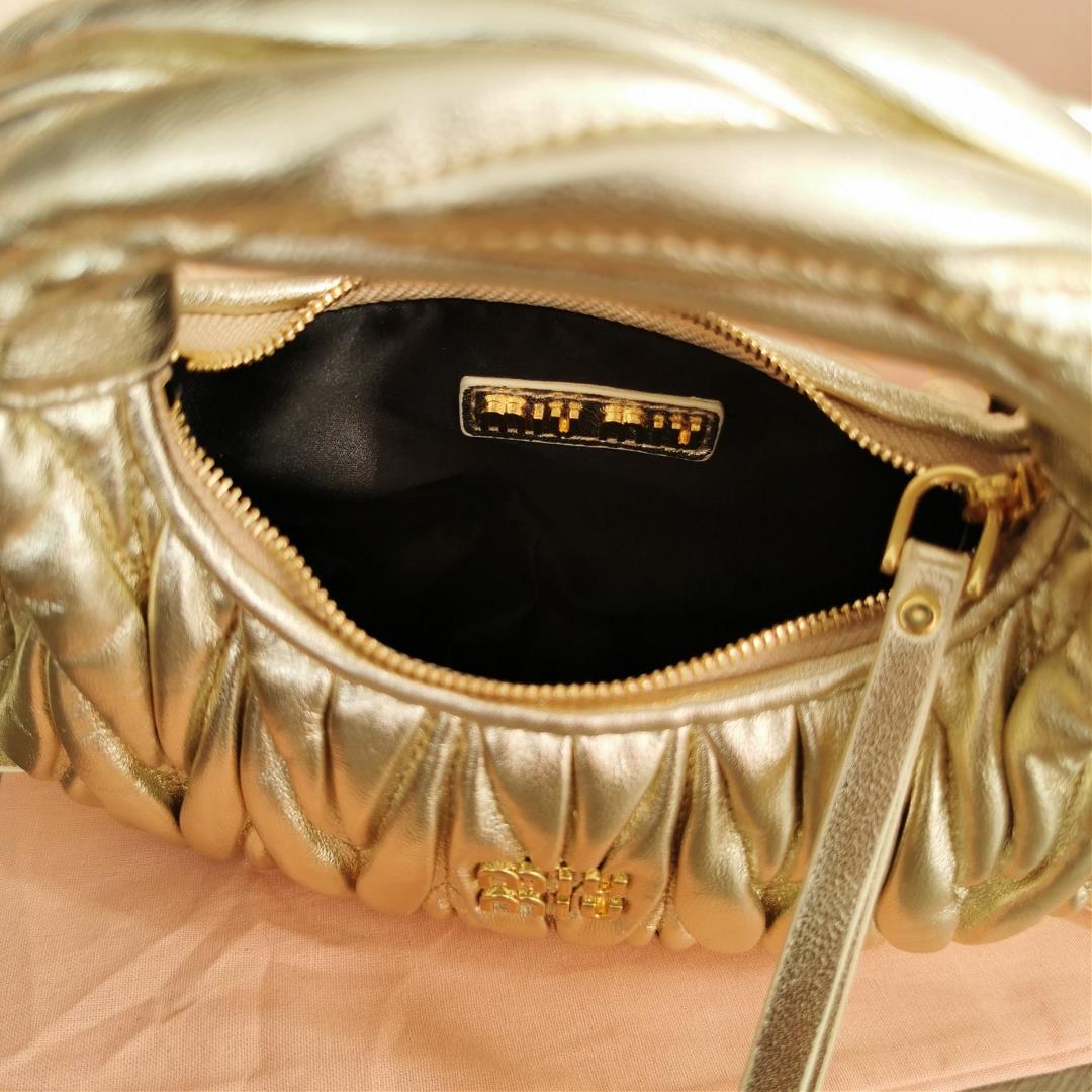 Small size The M familys new mini MiuWander handbag features imported lamb skin classic brand 