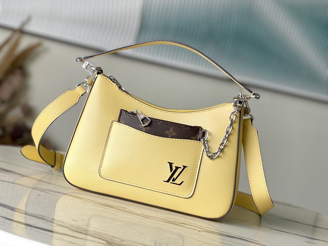 The M22215 Chicken Yellow Marelle handbag is crafted with elegant Epi grain leather to create a mode