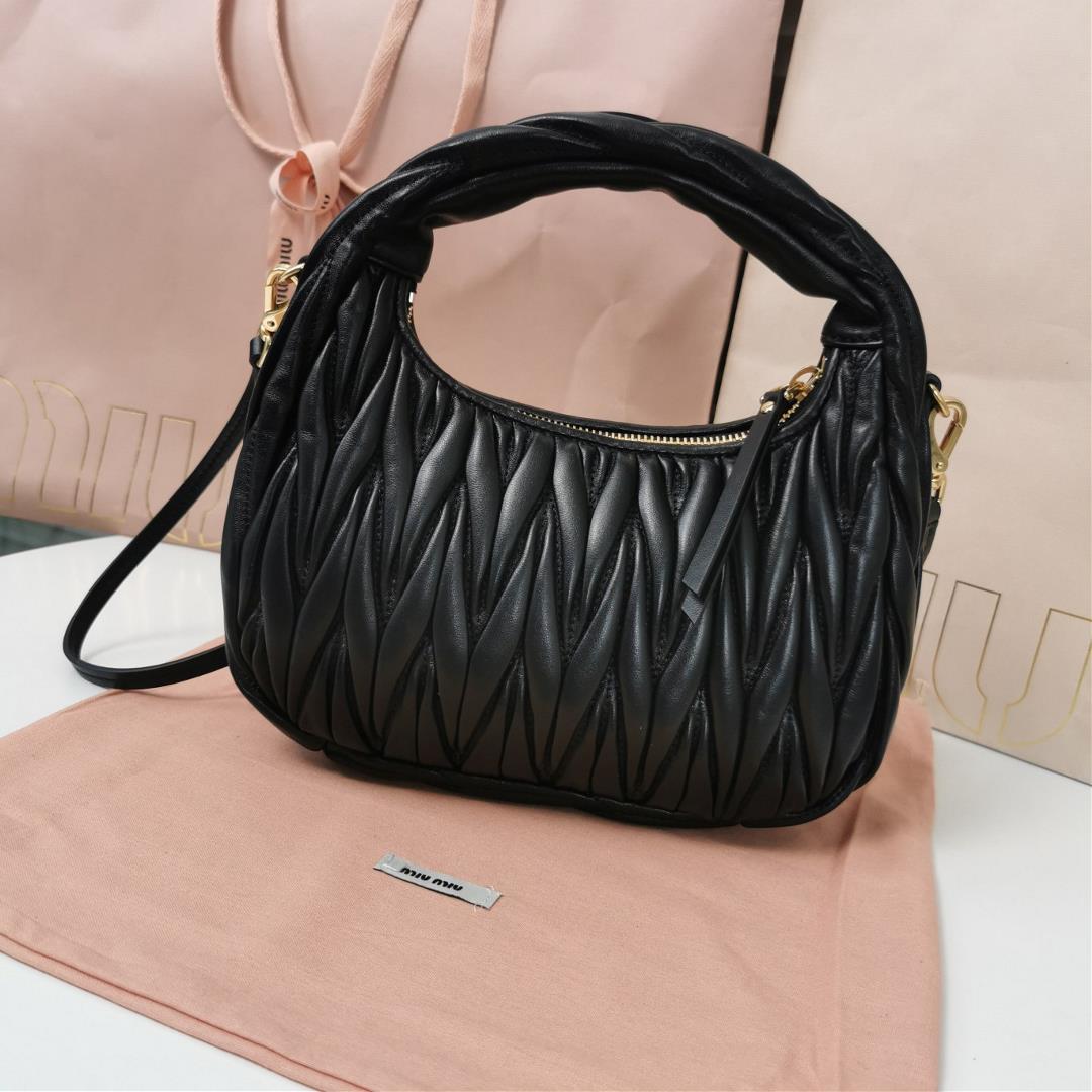 Medium The MiuWander handbag a new product from M family features the iconic Matelasse texture