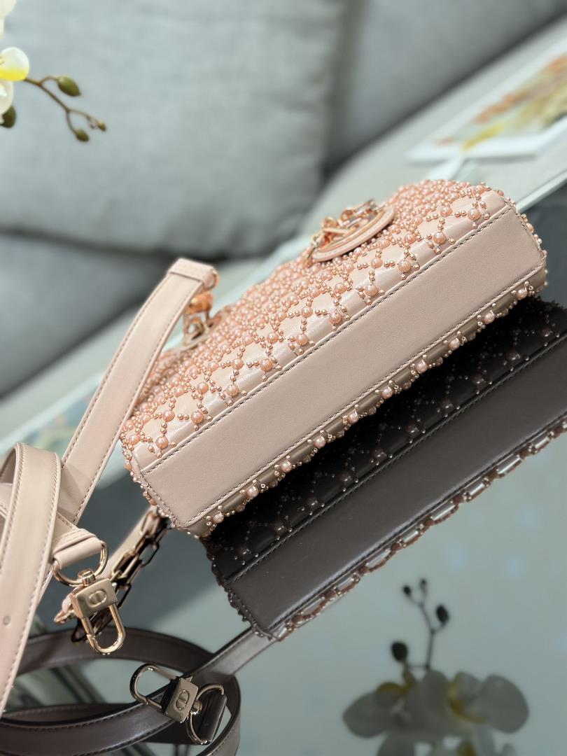 The Lady DJoy horizontal embroidery features half pearl rose gold and a sheepskin lining