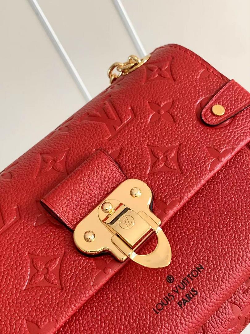 M44550The smooth and embossed Monogram Imprente combines silky and textured texture with