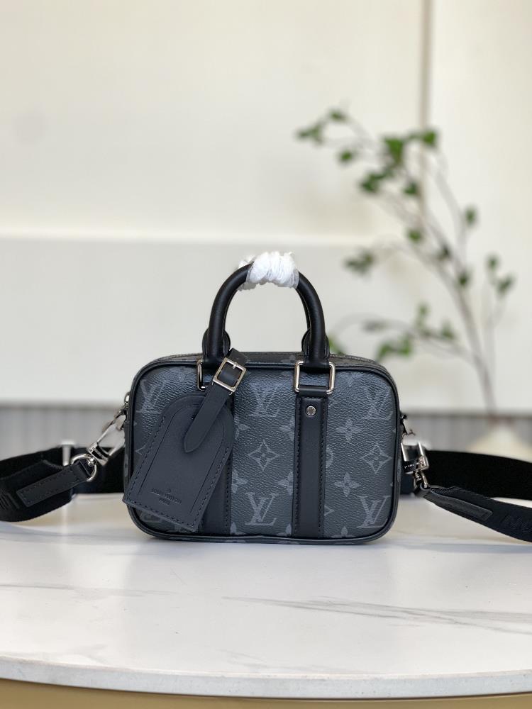 M82770 Black Flower This Nano Porte Documents Voyage handbag pays tribute to the classic prototype design inheriting elements such as zipper closure