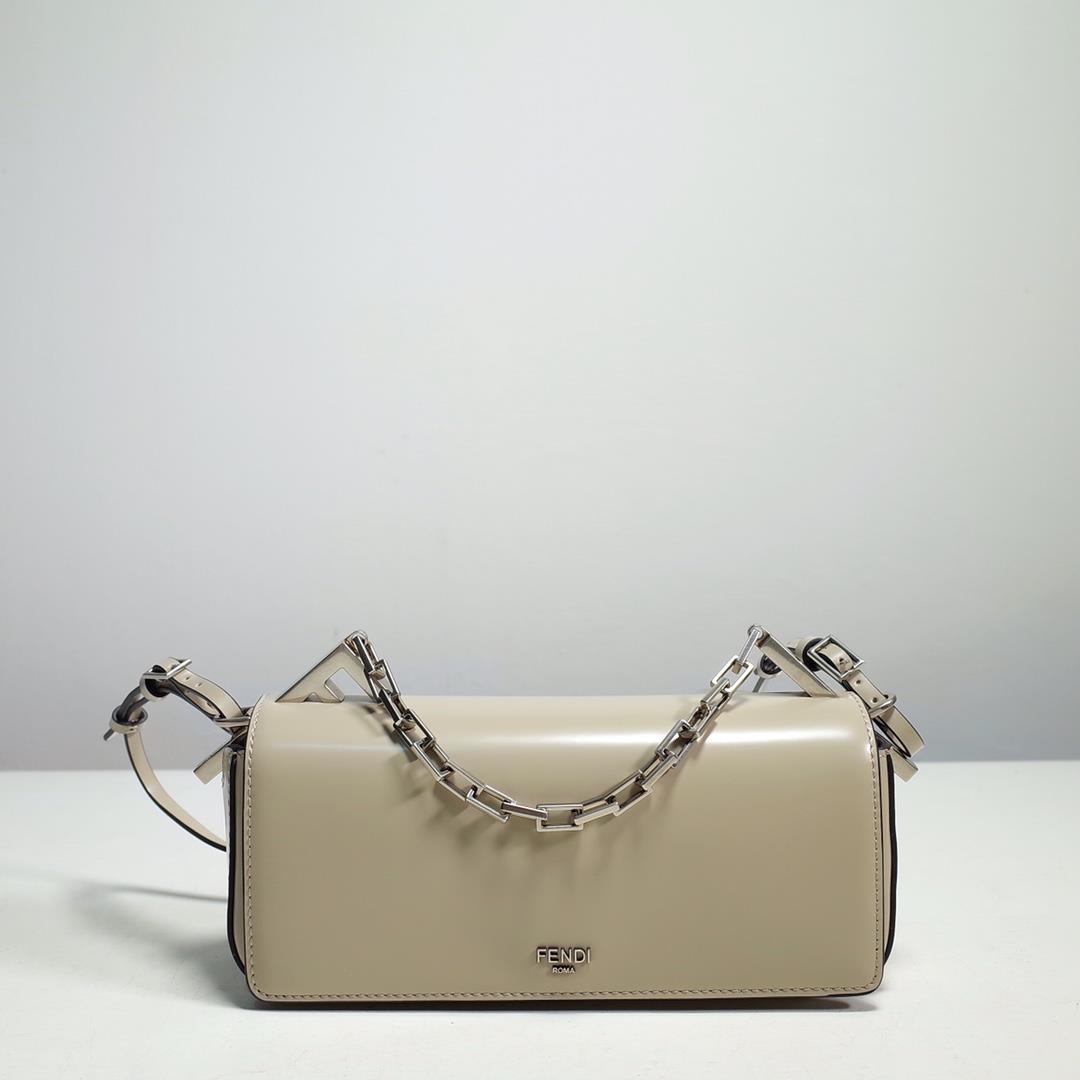 The FENDI handheld bag is made of beige brushed leather material decorated with large F metal access