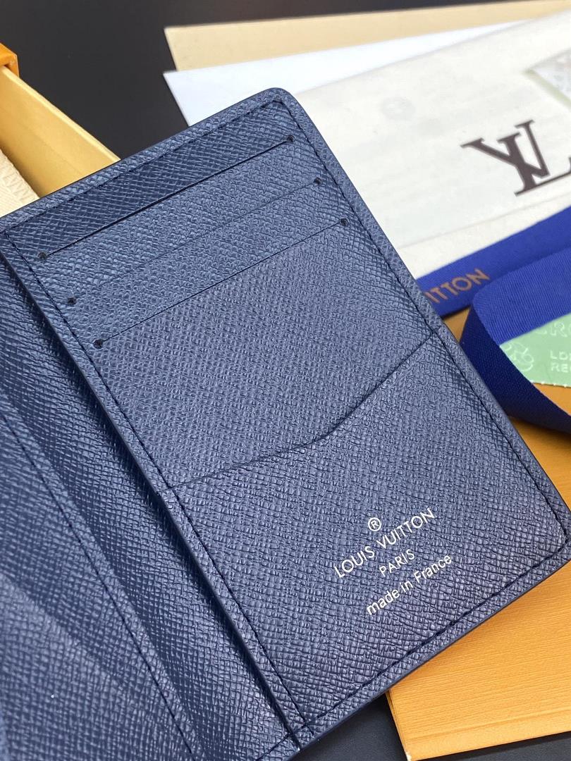 M82308 Royal Blue pocket wallet made of Monogram Aquagarden canvas showcasing the classi