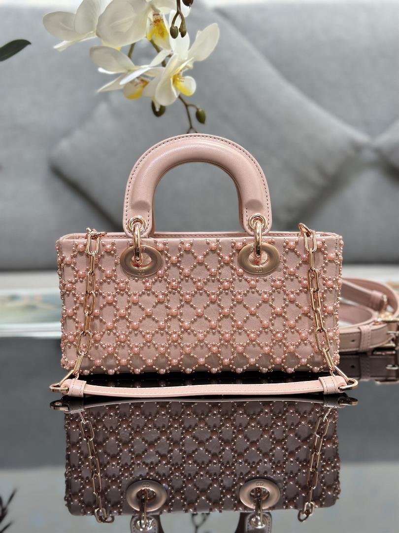 The Lady DJoy horizontal embroidery features half pearl rose gold and a sheepskin lining