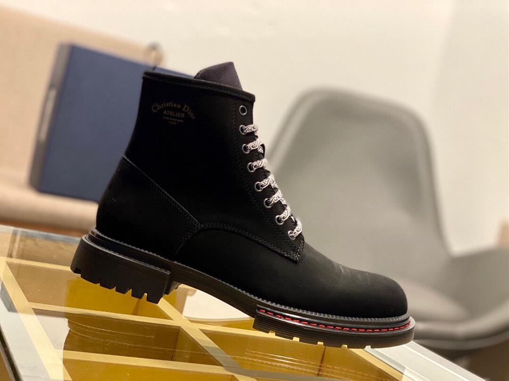 The first thing that catches my eye is the unique blend of materials used in these boots