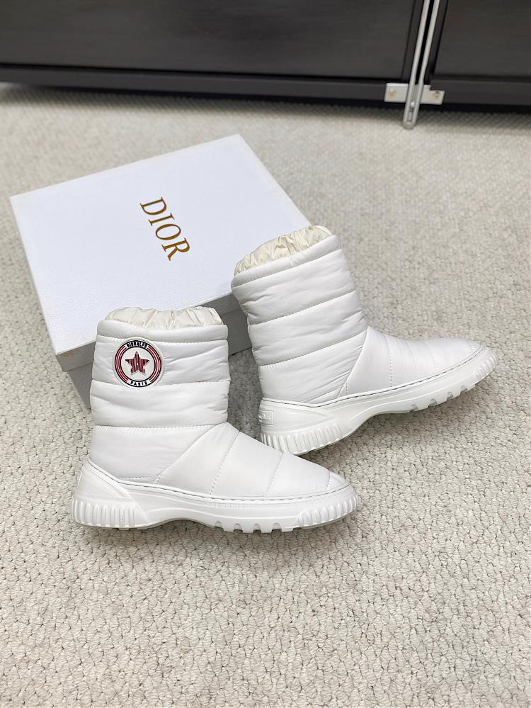 Dior Frost Ankle boots incorporate a high binding style showcasing a new skiing look The